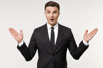 Young pensive caucasian successful employee business corporate lawyer man 20s wearing classic formal black grey suit shirt tie work in office look aside isolated on white background studio portrait