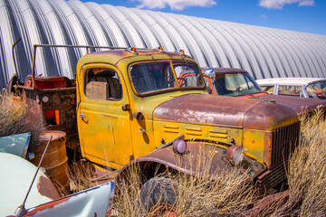 Exterior of vintage retro truck in a junkyard.