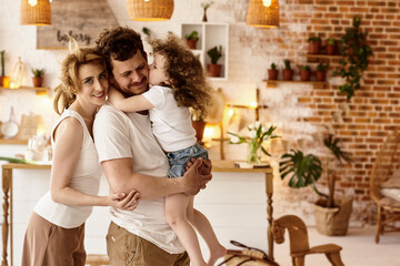 happy family having fun in the kitchen