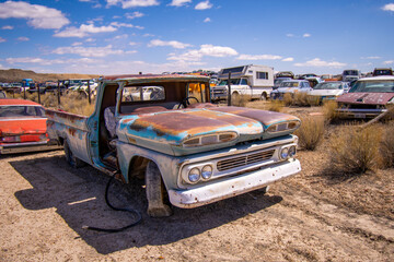 Obraz na płótnie Canvas Exterior of vintage retro truck in a junkyard.