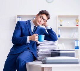 Businessman making copies in copying machine