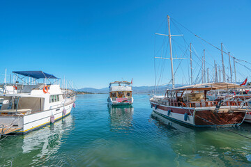 Fototapeta na wymiar Panoramic view of Fethiye,which is one of the best coastal regions in Turkey, famous with its crystal clear sea, blue sky, unique geography.