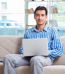 Caucasian student with laptop preparing for university exams