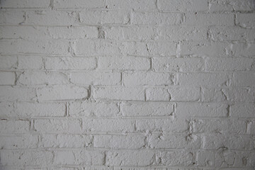 Close-up of a white brick wall texture background. Old hipster wall tiles