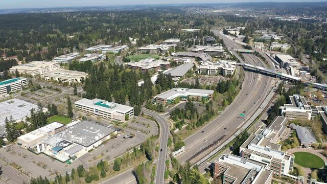Cinematic aerial drone video, development of the new campus at the Microsoft Corporate Headquarters, Microsoft Commons, Microsoft Studio in Overlake and Redmond, Washington, near Bellevue, Seattle
