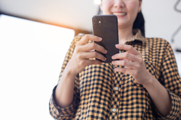 using cell phone hand holding mobile texting message contact us.chatting,search internet...