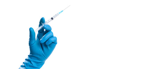 Hand holding syringe with vaccine against corona virus.