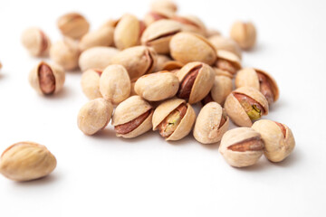 Pile of pistachios on a white background. Set of Pistachio nuts
