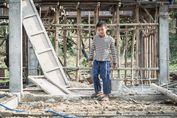 Children working at construction site for world day against child labor concept, Poverty, Human trafficking.