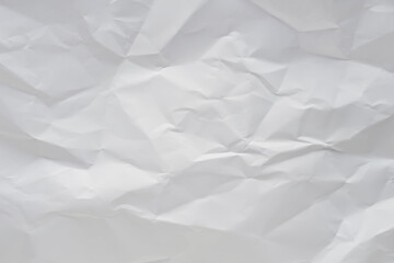 White crumpled paper texture background.