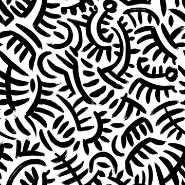 Tribal and ethnic abstract vector seamless pattern. Hand drawn aztec or indian style black and white background. Doodle rounded lines, dashes, primitive motif. Modern graphic design. Freehand textures