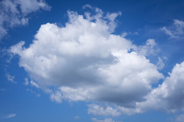 Naklejka na ściany i meble big white clouds in blue sky as background