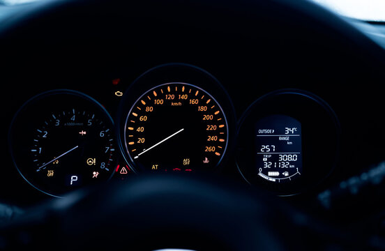 Car dashboard interior view. Car instrument panel with tachometer and speedometer. Data information dashboard show gas tank and full battery level icon. rpm gauge and speed meter. Hybrid car dashboard