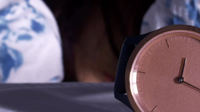 Timelapse of bedside table clock running fast in bedroom