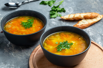 Red lentil soup. Traditional turkish or arabic lentil and vegetable spicy soup, healthy vegan food. Food recipe background. Close up