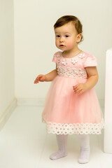 Cute Pretty Toddler Girl Wearing Nice Dress Looking with Curiosi