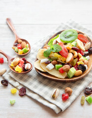 Bowls with various dried fruits and nuts