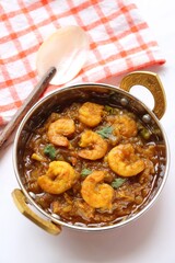 Indian food- Prawns masala or shrimp curry. Also known as Kolambi che Kalvan in Marathi. Chingri fry. Maharashtrian Prawns curry. Copy space.