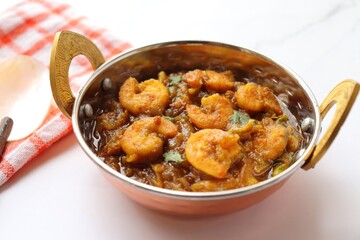 Indian food- Prawns masala or shrimp curry. Also known as Kolambi che Kalvan in Marathi. Chingri fry. Maharashtrian Prawns curry. Copy space.