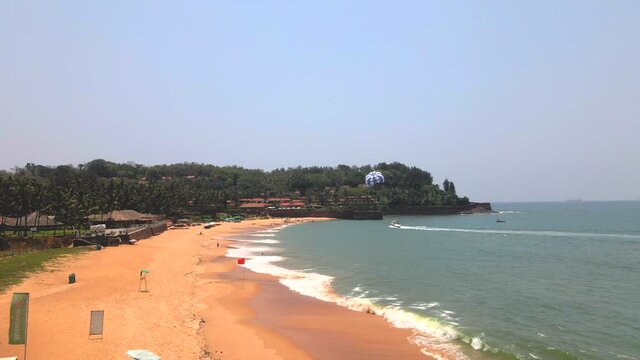 goa Sinquerim Beach drone shot paragliding bird's eye view