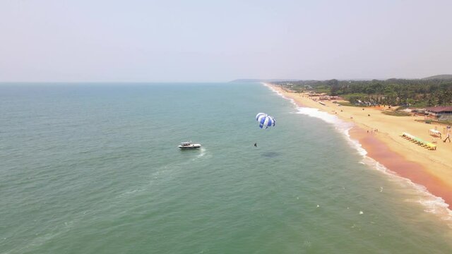 goa Sinquerim Beach drone bird's eye view paragliding in goa  zoom outshot