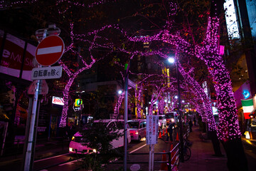 A night illuminated street in Shibuya wide shot