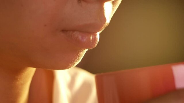 Close up of young women drinking hot coffee in the living room at home. Stay at home to quarantine fro