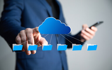 man holding phone and cloud with files icon
