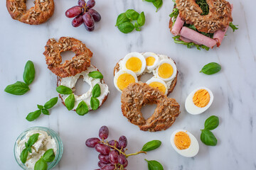 freshly baked whole grain bagels. heap of fresh baked bagels