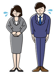 謝罪をしているビジネスマンとビジネスウーマン