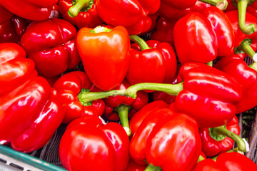 Red Bell Peppers on Display in Supermarket.