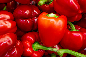 Red Bell Peppers on Display in Supermarket.