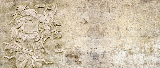 Grunge background with stone wall texture and bas-relief of a Mayan king Pakal