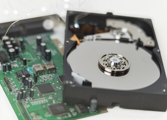 Inside dise in hard drive on the technician's desk.
