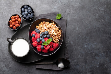 Healthy breakfast with granola, yogurt and berries