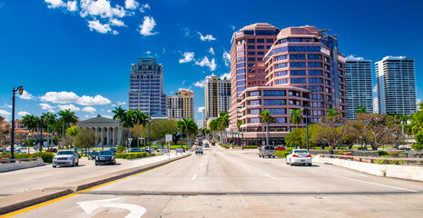 PALM BEACH, FL - FEBRUARY 2016: City traffic along Royal Palm Way