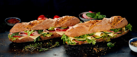 Savory sandwiches near vegetables and spices