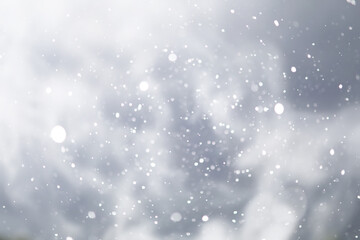 blue snowfall bokeh background, abstract snowflake background on blurred abstract blue