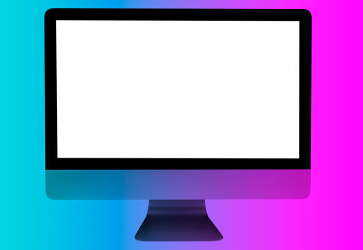Pc computer on office desk  in blue and pink tones. Workspace with computer showing blank isolated white screen with copy space. Empty space for text