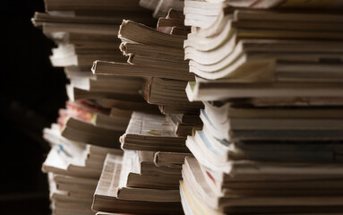 Stacks of magazines close up