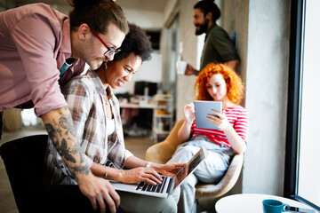 Fototapeta premium Creative managers crew working with new startup project in office. Team brainstorming.