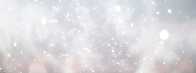 Fototapeta premium blue snowfall bokeh background, abstract snowflake background on blurred abstract blue