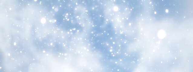 blue snowfall bokeh background, abstract snowflake background on blurred abstract blue