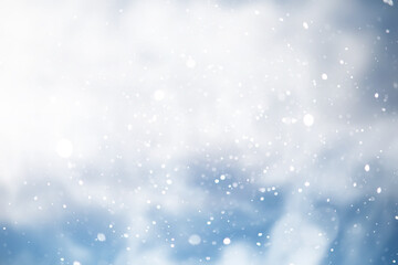 blue snowfall bokeh background, abstract snowflake background on blurred abstract blue