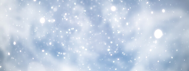 blue snowfall bokeh background, abstract snowflake background on blurred abstract blue