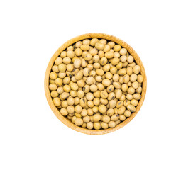 Uncooked dry Soybeans in wooden bowl on white background, top view.