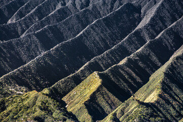 Pattern of mountain range wave surface in Tengger caldera. This mountain range is part of Tengger massif in Bromo Tengger Semeru National Park. Beautiful landscape volcano in East Java, Indonesia.