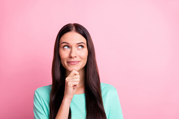 Photo of young beautiful lovely positive smiling thoughtful girl look copyspace thinking isolated...