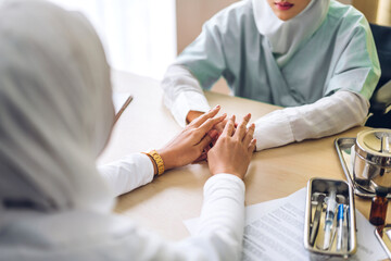 Muslim asian woman doctor service help support discussing and consulting talk to muslim woman...