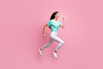 Fototapeta na wymiar Full size profile side photo of young attractive crazy positive girl running in air isolated on pink color background